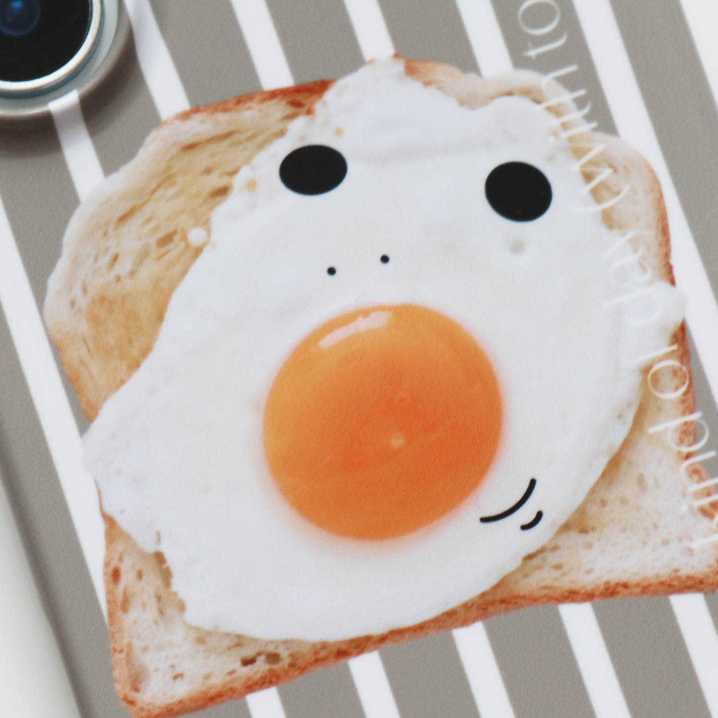 トーストとめだまやきみくんのスマホケース