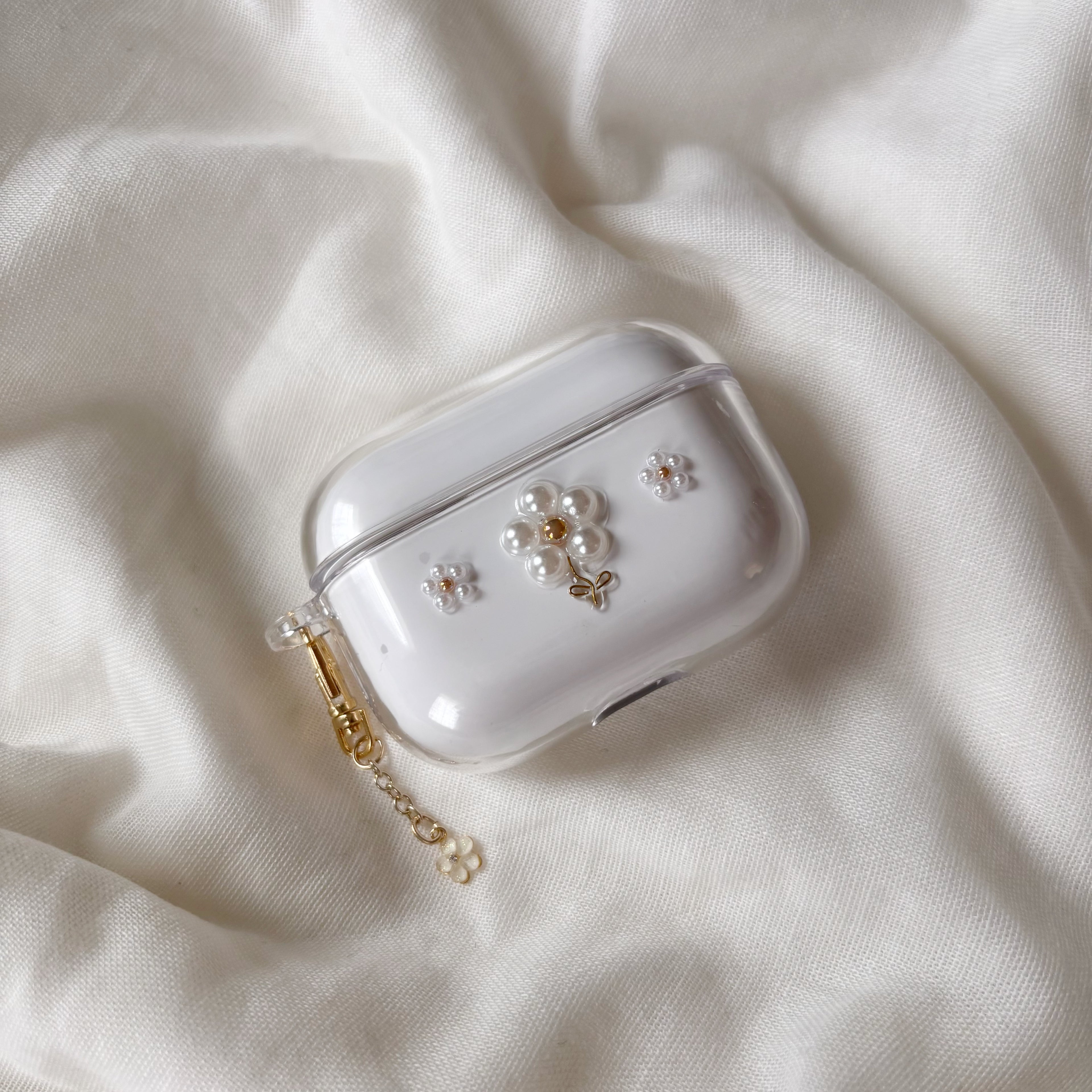 小さなお花のAirPodsケース ブラウンゴールド