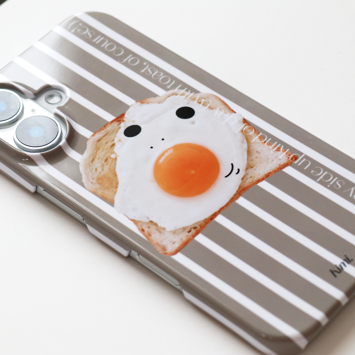 トーストとめだまやきみくんのスマホケース